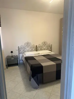 Letto o letti in una camera di Casa Cioppy