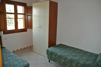 Letto o letti in una camera di Residence Le Zagare