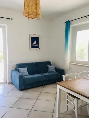 Area soggiorno di Beach House Ilaria - Turchese Apt