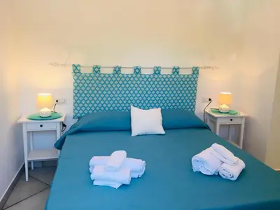 Letto o letti in una camera di Beach House Ilaria - Turchese Apt