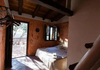 Letto o letti in una camera di Ecoparco Neulè