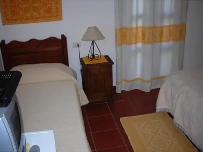Letto o letti in una camera di Bed & Breakfast Dessole