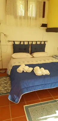 Letto o letti in una camera di Monolocale indipendente con giardino