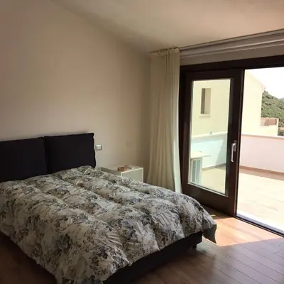 Letto o letti in una camera di Sardinia house with beautiful view near sea