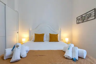 Letto o letti in una camera di Casa Sergio