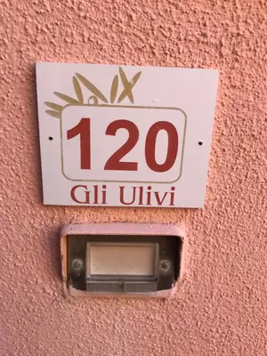 Certificato, attestato, insegna o altro documento esposto da Bilocale Residence Gli Ulivi San Teodoro