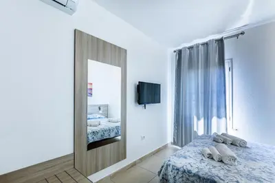 Letto o letti in una camera di Affittacamere Blue Sea