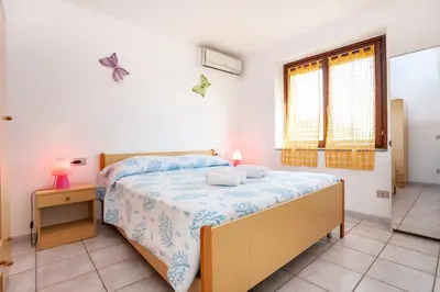 Letto o letti in una camera di Villino Bilo Centro