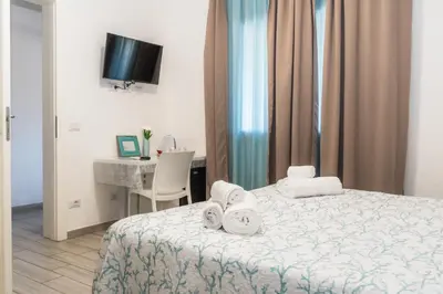 Letto o letti in una camera di Caletta sul Mare