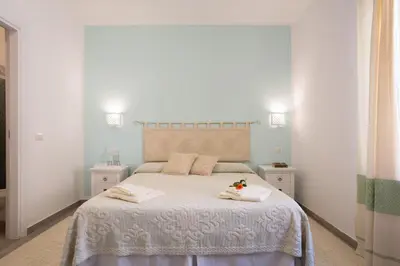 Letto o letti in una camera di Casa Berenice