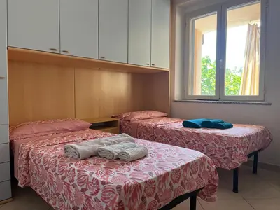 Letto o letti in una camera di Azalee P2228