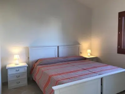Letto o letti in una camera di Corallo
