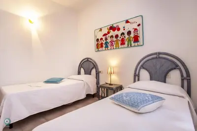 Letto o letti in una camera di Villino Funtana