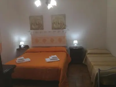 Letto o letti in una camera di Carpe Diem