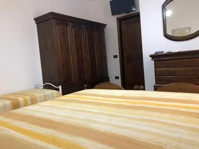 Letto o letti in una camera di Carpe Diem