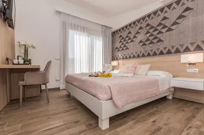 Letto o letti in una camera di Relais del Borgo- Domo