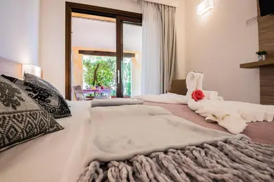 Letto o letti in una camera di Relais del Borgo- Domo