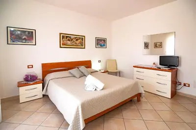 Letto o letti in una camera di Le Dune