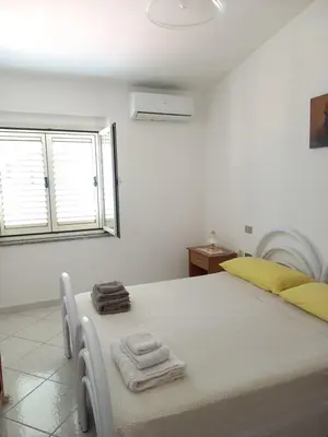 Letto o letti in una camera di Santu Luisu