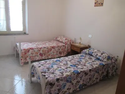 Letto o letti in una camera di Santu Luisu