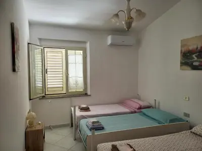 Letto o letti in una camera di Santu Luisu