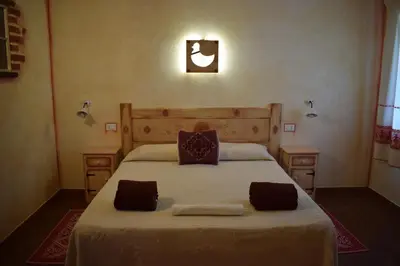 Letto o letti in una camera di Canne al Vento
