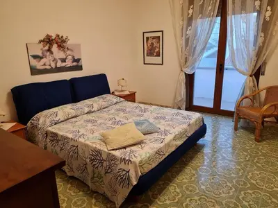 Letto o letti in una camera di casa perla