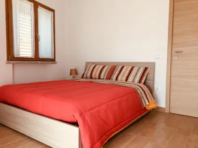 Letto o letti in una camera di CAV Mameli