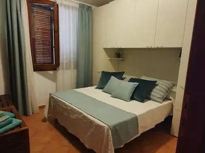 Letto o letti in una camera di CASA BIJOUX