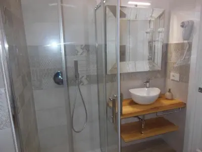 Bagno di PUNTO ZERO ROOMS