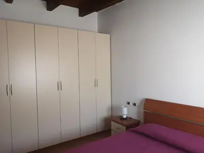 Letto o letti in una camera di GaLi eco-apartment