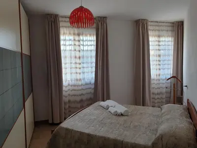 Letto o letti in una camera di San Simplicio eco-apartment