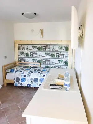 Letto o letti in una camera di B&B Tavolara