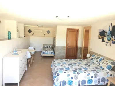 Letto o letti in una camera di B&B Tavolara