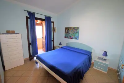 Letto o letti in una camera di Domo de Mari