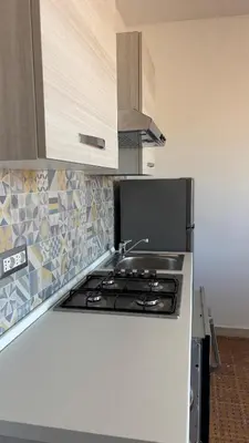 Cucina o angolo cottura di A Casa di Nonno tra mare e montagna AC WiFi
