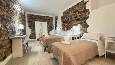 Letto o letti in una camera di A Casa di Nonno tra mare e montagna AC WiFi