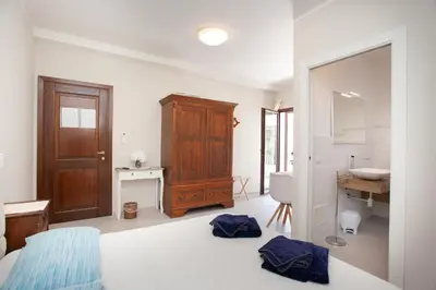 Letto o letti in una camera di Lu Lioni Rooms