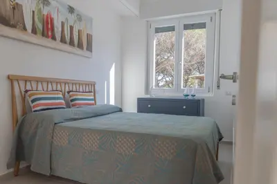 Letto o letti in una camera di Villa B. Calaliberotto