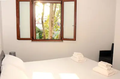 Letto o letti in una camera di Appartamenti Fronte mare