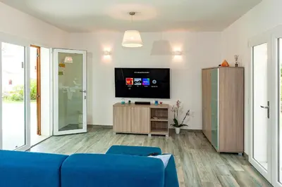 TV o dispositivi per l'intrattenimento presso VILLA PARADISE