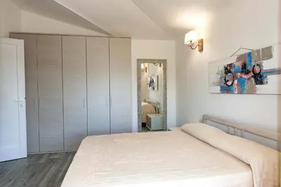 Letto o letti in una camera di VILLA PARADISE