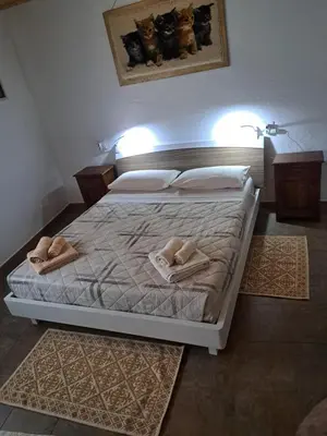 Letto o letti in una camera di Casa Toloi
