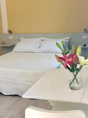 Letto o letti in una camera di Borgo Albador Rooms