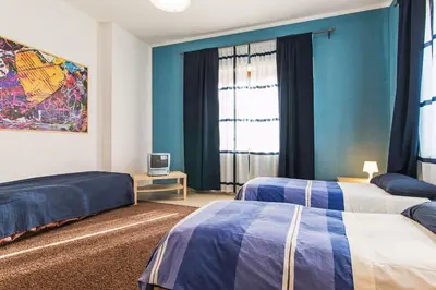 Letto o letti in una camera di MARY HOUSE