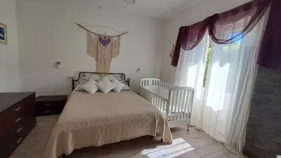 Letto o letti in una camera di casa oleandri