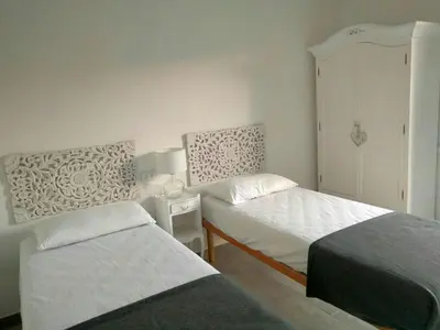 Letto o letti in una camera di La Cinta