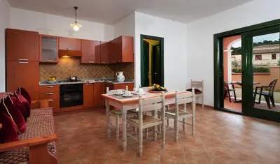 Cucina o angolo cottura di Appartamenti Le Ginestre e Gli Oleandri