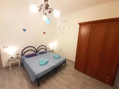 Letto o letti in una camera di OLBIA CENTER VIA ROMA 22