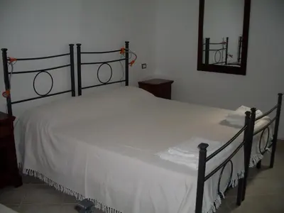 Letto o letti in una camera di Affittacamere Peonia